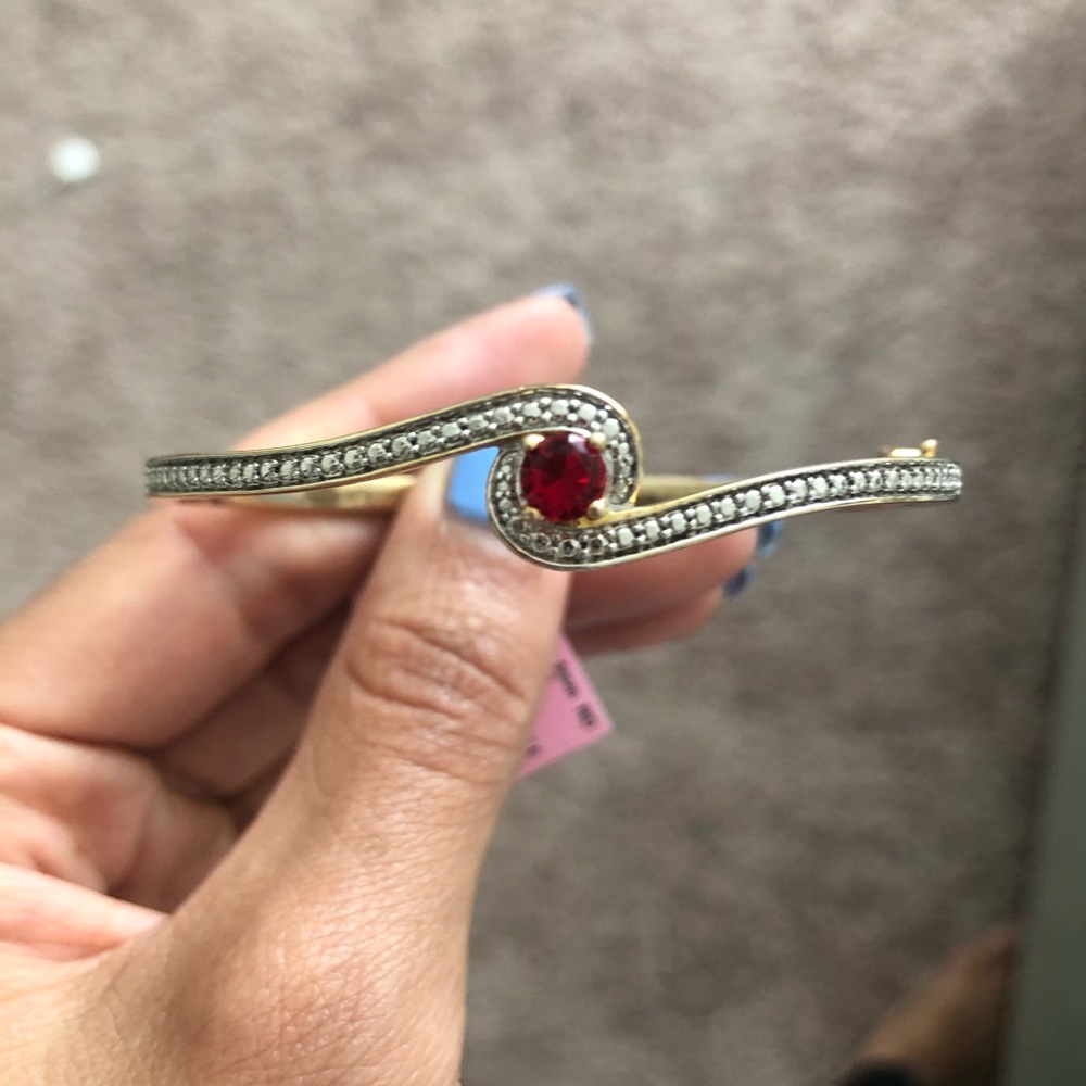 Gold bracelet with ruby. Never worn.